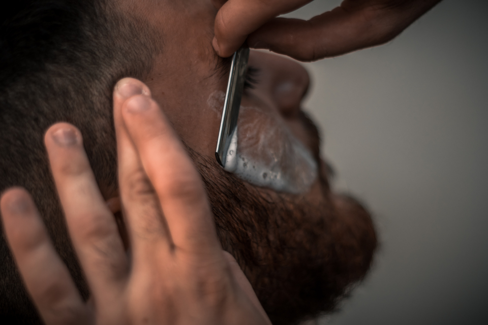 Close-up of a careful, well-lathered shave, the gentle approach to use after a transplant